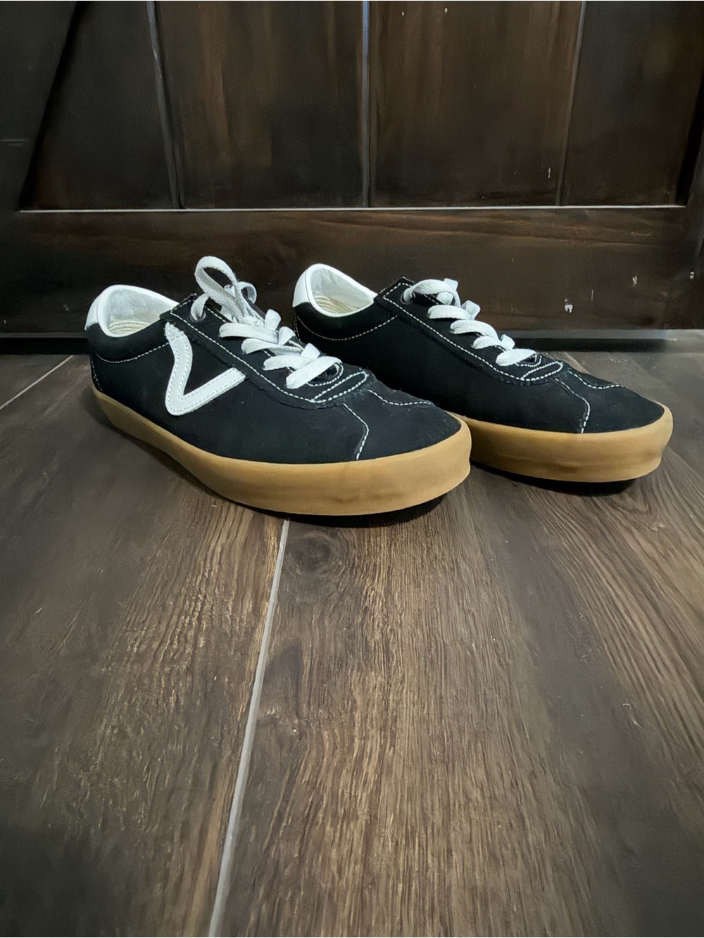 Vans Black Sneakers with White Accents and Gum Sole